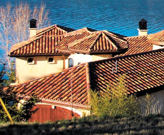 Forever roofing: Contractor works in concrete, slate and clay