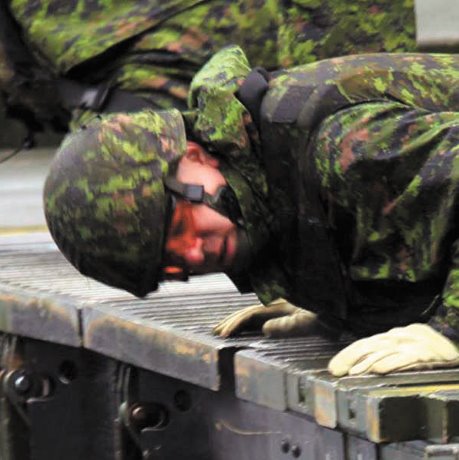 Combat engineers battle the elements to build bridges