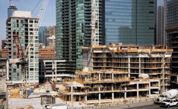 PHOTO: Conservatory Group works on Infinity Condominiums in Toronto