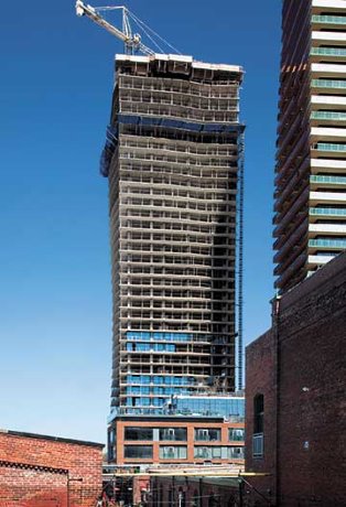 PHOTO: Tucker Hi-Rise continues construction on 37-storey Gooderham Condos in Toronto