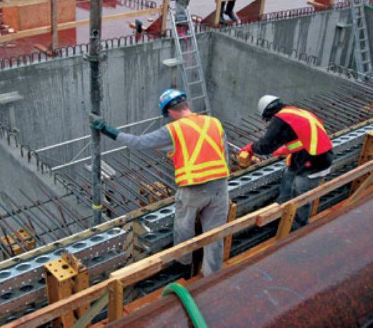 Steel piles set in place for floating bridge