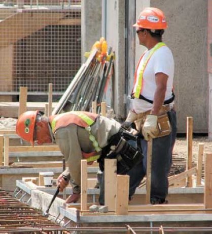Alsa Road Construction Ltd. does the sidewalk shuffle