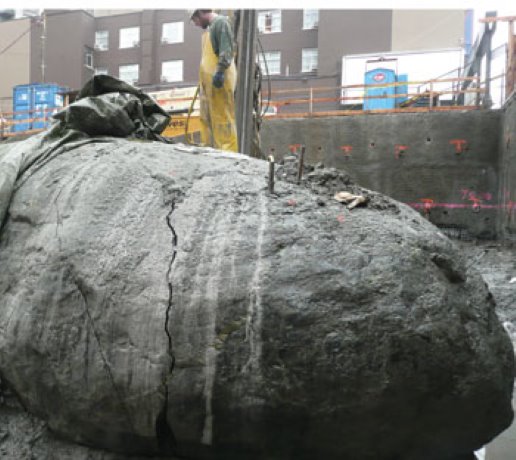 Big boulder no match for non-explosive demo compound