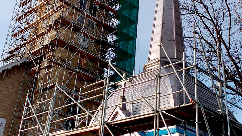 Delicate craftsmanship, rigging secures church steeple