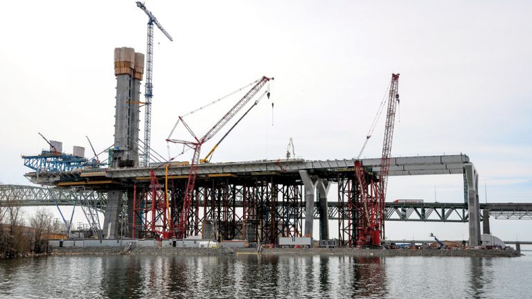 Work continues on the Champlain Bridge in Montreal towards an expected December completion. In March, teams for the cable-stayed portion installed the first main span segment over the St. Lawrence River.