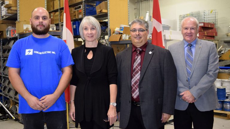 Federal Minister of Employment, Workforce Development and Labour Patty Hajdu joined (from left) electrical apprentice Ian Currell, Stephen Sell, president of the Ontario Electrical League, and OEL board chair Dale MacDonald at the premises of Corlan Electric in Mississauga to announce a new employer engagement program designed to boost apprenticeships.