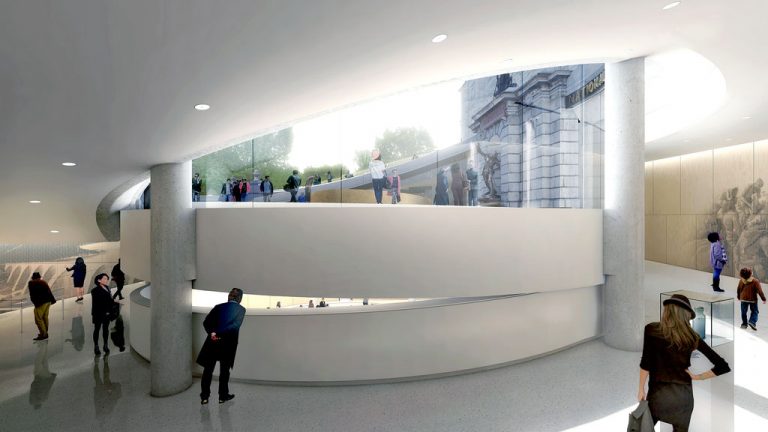 A 300-metre-long ramp organizes spaces in a new underground reception pavilion being constructed at the provincial legislature building in Quebec City. The ramp also houses building systems. The entrance to the pavilion is seen in the background. The pavilion is scheduled to open next spring.