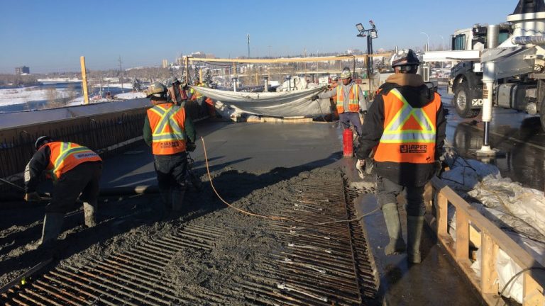 Crews pour a new lane on Crowchild Trail to add another lane to its crossing over the Bow River in Calgary. The team has had to get creative to keep the major route open while work is being done.