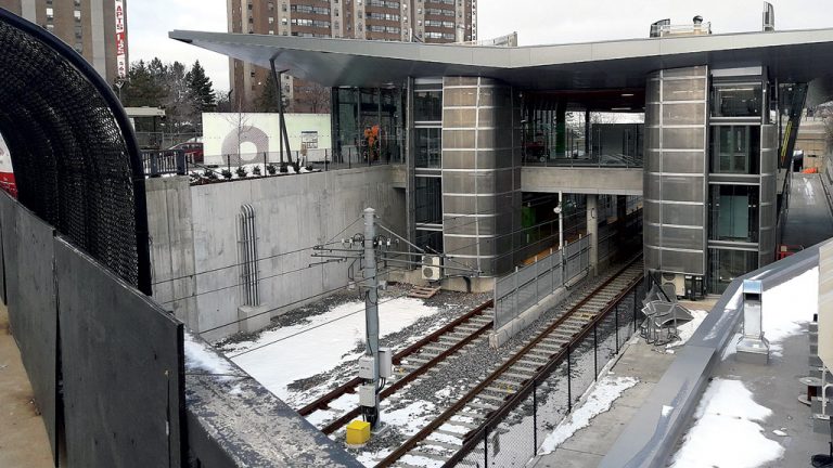 Work wraps up at Lees station, one of 13 stations on the 12.5-kilometre LRT route, in December. Ten kilometres of track run above ground and 2.5 kilometres underground with three stations located underground in the new downtown tunnel.