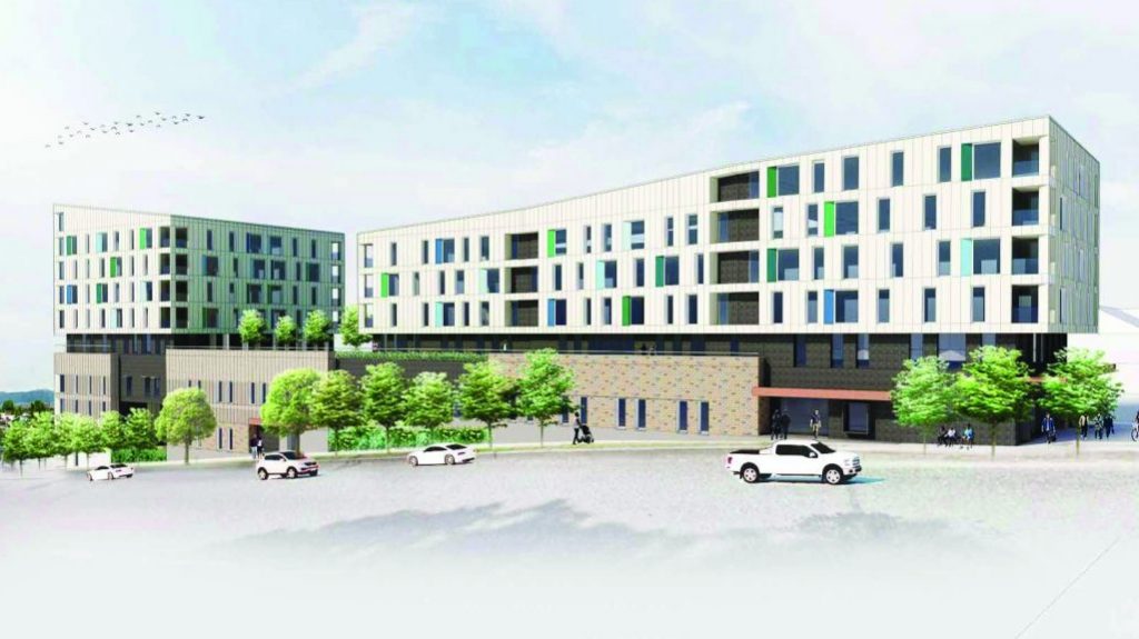 A rendering of the view looking north across East 1st Avenue of the proposed $81-million drug addiction rehabilitation centre and social housing project in Vancouver.