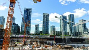 The multi-use project The Well, currently under construction at Spadina Avenue and Front Street in Toronto, is busy on multiple fronts. Note the crane on the left supporting the Toronto Raptors’ efforts to win the NBA title. An Altus Group report states The Well project will generate approximately $4.2 billion in economic activity and create bout 22,295 person-years of direct, indirect and induced employment.