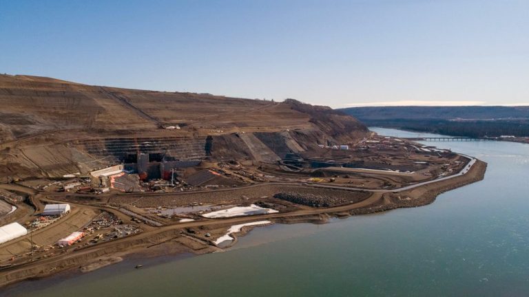 An aerial view shows the upstream area of Site C’s diversion tunnel inlet portal on the north bank of the Peace River. One of the project’s main contractors, Peace River Hydro Partners was recently hit with a large penalty by WorkSafeBC.