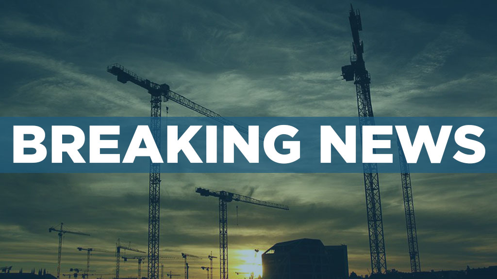 BREAKING NEWS UPDATE: Crane hits building in Toronto, minor injuries reported