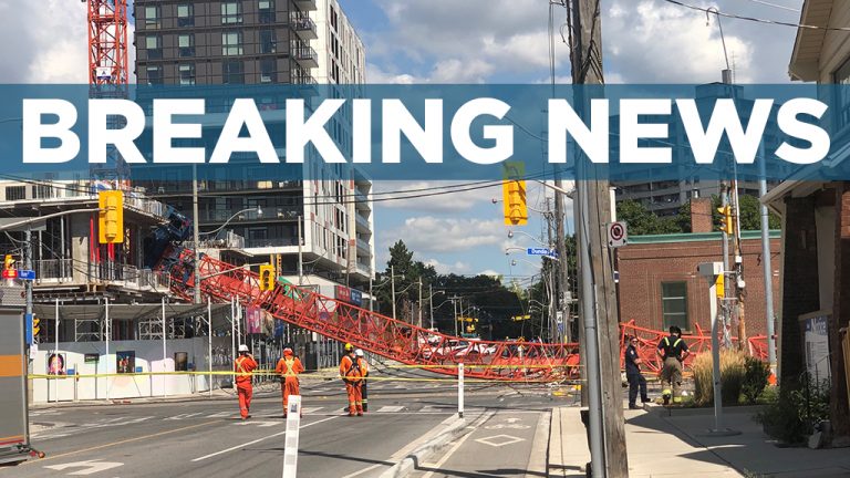 Toronto Police have reported an incident of a stationary crane falling into the intersection of River Street and Dundas Street in east Toronto. The Ministry of Labour has been called in to investigate and minor injuries were reported.