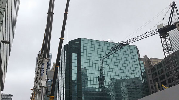 On July 17 crews dismantled a crane that collapsed into a building in downtown Toronto. No one was injured in the incident that occurred on July 16 and Toronto Fire Services secured the scene.