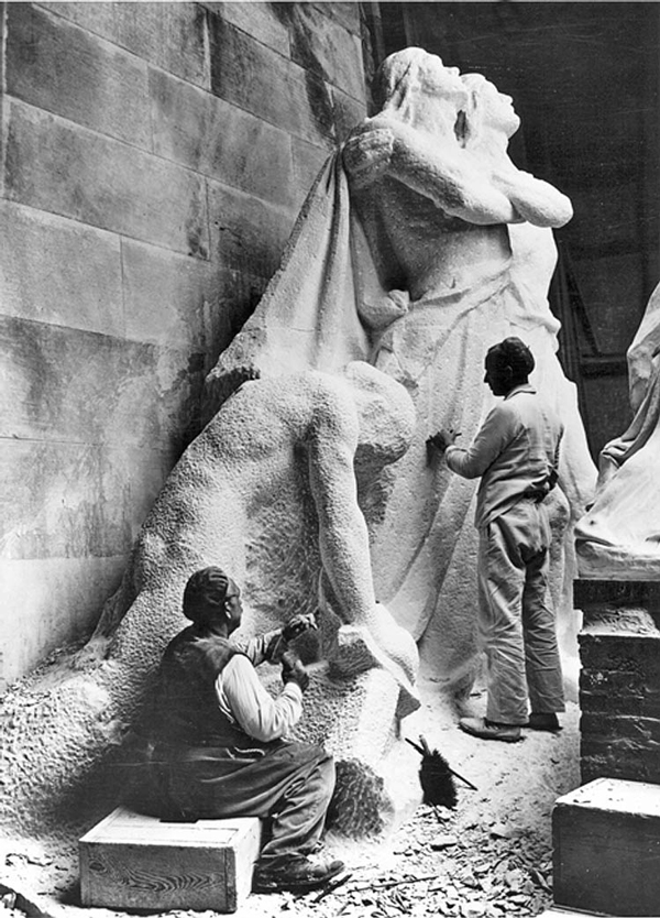 Carvers chip away at limestone blocks shipped in from Croatia to build the Canadian National Vimy Memorial on Canadian soil in France.