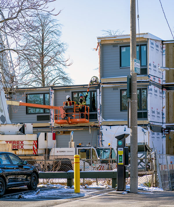 Two City of Toronto affordable housing projects, on Macey Avenue and Harrison Street, will be ready for occupancy in December 2020 and January 2021 respectively. Pictured are workers on the job on Harrison Street.