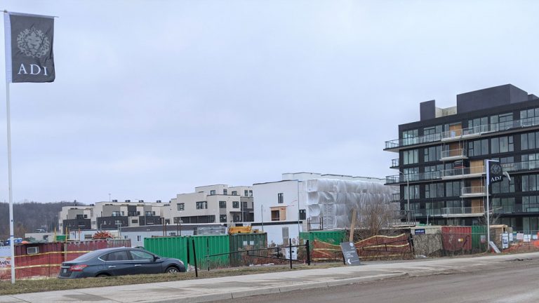 A day after Ontario declared a COVID-19 state of emergency with additional lockdown measures affecting some sectors of construction, work continued at this Adi Development Group housing site in west Burlington.
