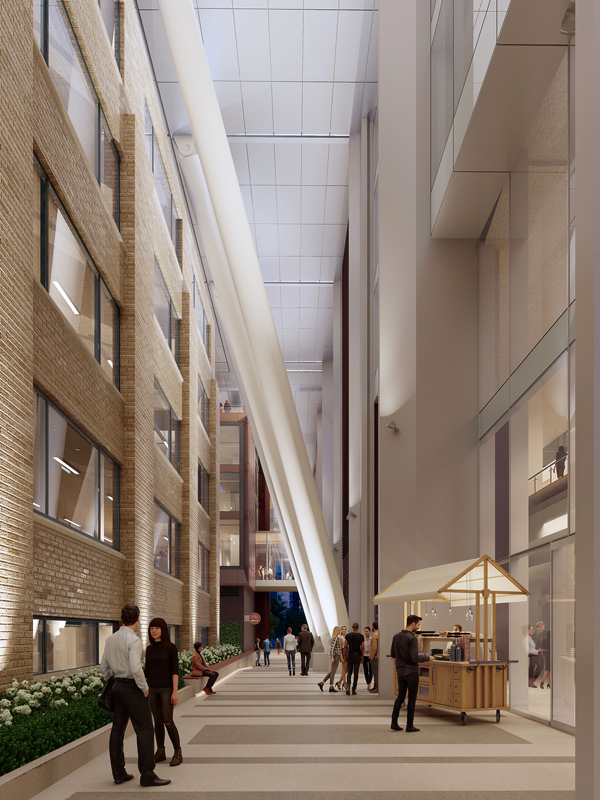 Some of the design opportunities on the Portland Commons office project in Toronto include interior space logistics on the north end of the building where floors are cantilevered or straddled over the roof of a heritage building. The project, which started last September, is scheduled for completion in the fall of 2023. Construction is by EllisDon Corporation.
