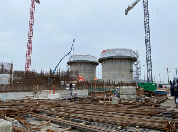 Thick walls of concrete are now rising at the North Shore Wastewater Treatment Plant and two massive, cylindrical digesters are being built. When completed, they will be 25 metres tall.