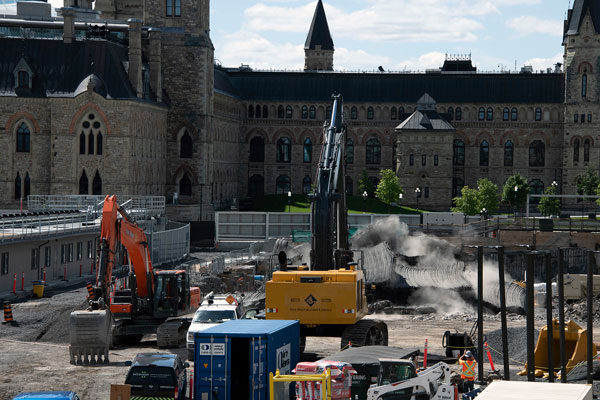 Included in the Centre Block renovation and restoration is the expansion of the underground Parliament Welcome Centre to provide a more welcoming experience for visitors. This photo from August 2020 shows a controlled blast in the area near the West Block in support of excavation activities.