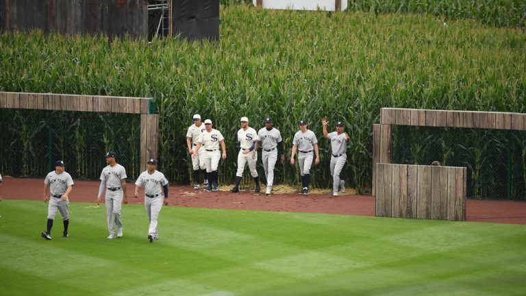 Players from the Yankees and White Sox entered the field of play though the outfield via cornfields to launch the Aug. 12 Field of Dreams game.