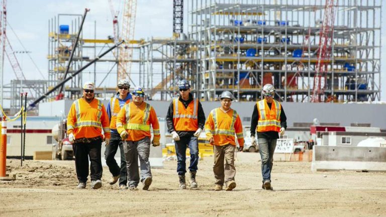 A crew with Great Plains Contracting, an Indigenous-owned construction company in Saskatchewan, chats at a site. It is one of a handful of companies that is looking to create a voice for Indigenous construction companies in the province by forming the Indigenous Owned Construction Companies Group.