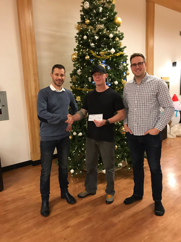 The Christian Labour Association of Canada presents an annual award to celebrate a CLAC member who has successfully completed a treatment program. Pictured is recent winner Kit Wells (centre), receiving the award from CLAC representatives Josh Pastoor (left) and Curtis Haugan.