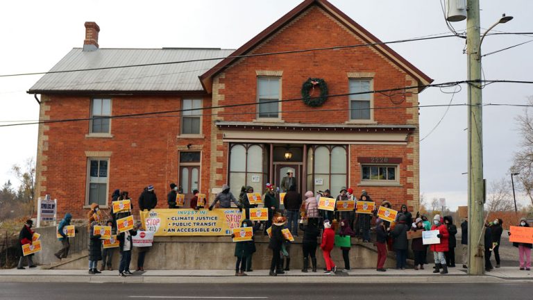 Opponents to Highway 413 held a day of action Nov. 13 with protests in four municipalities. Pictured, protesters picket the constituency office of Minister of Education Stephen Lecce in King City.