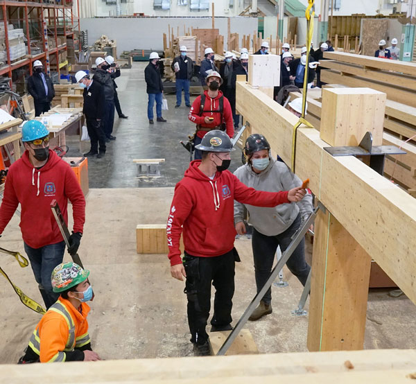 Tour delegates visit the mass timber training course at the College of Carpenters and Allied Trades training centre in Woodbridge, Ont.