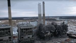 Images from a Delsan-AIM video show three 168-metre decommissioned smokestacks and four boiler buildings crashing to the ground at the former Lambton Generation Station on Feb. 12.