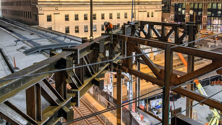 Supermetal is confined to a narrow window to work each night, erecting massive girders at the CIBC Square overbuild site between midnight and 5 a.m.