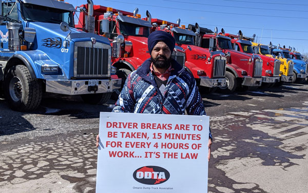 Dump truck owner-operator Manwinder Singh Dhalla, owner of five trucks, is protesting working conditions as part of the Ontario Dump Truck Association job action.