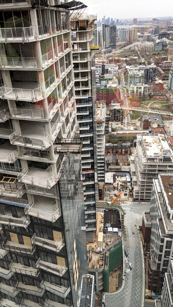 Tridel and RioCan Living are building condos and rental units as part of the residential component of The Well. Projects under construction are seen from the 32nd floor of The Well’s office tower.
