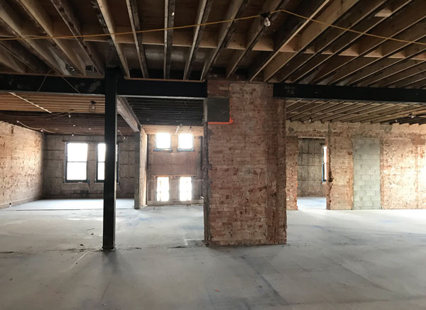 Creating the Y Lofts was a challenge, state the developers, with asbestos discovered, along with mold and lead paint. Every wall had to be sampled and stripped down.