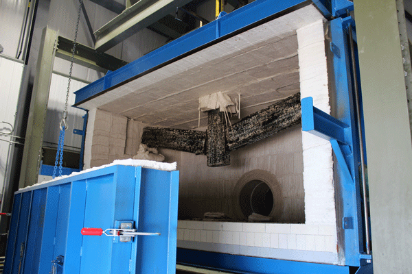 Pictured is a glulam sub-frame assembly with beam-to-column connections after completing a fire test.