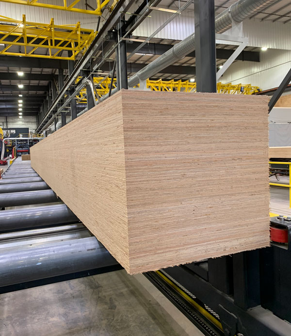 Layers of veneer are glued and pressed to form lamellas which are approximately an inch in thickness and these lamellas are layered and joined to form larger panels of varying size and thickness.