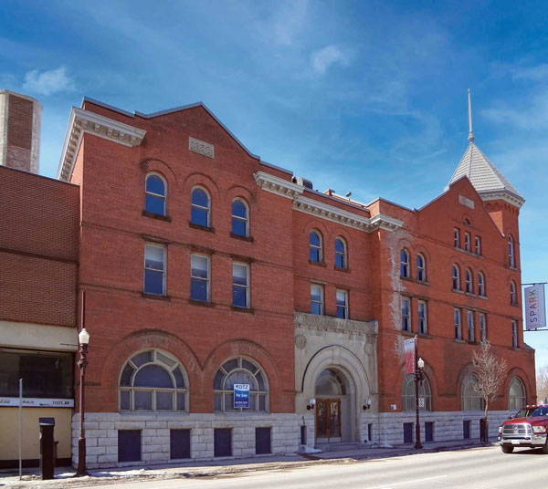 The original three-and-a-half storey red brick YMCA structure was built in 1896 and is an anchor in the Peterborough’s Civic Square.