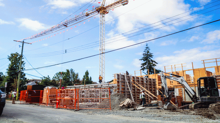 Crews work on a rental housing project in Victoria, B.C.