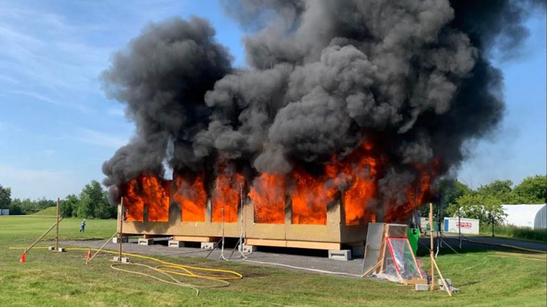 The research fire test on mass timber held recently by the Canadian Wood Council in Ottawa performed as expected, researchers reported, concluding the fire performance of the mass timber structure was similar to that of non-combustible construction.
