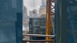 BREAKING: Video shows worker dangling from crane load at PCL site in Toronto
