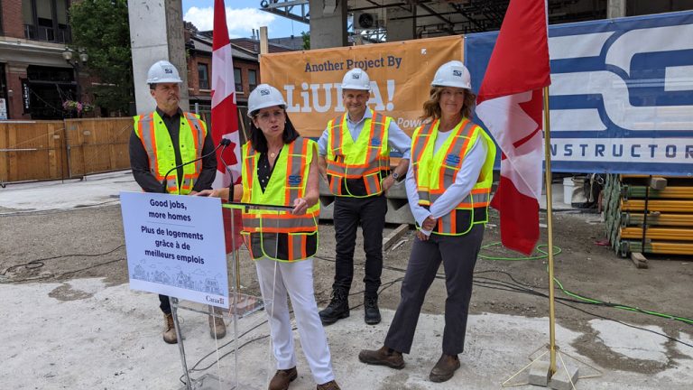 Federal Minister of Public Services and Procurement Filomena Tassi introduced Minister of Labour Seamus O’Regan (centre, back row) during a recent tour of a LIUNA worksite in Hamilton.
