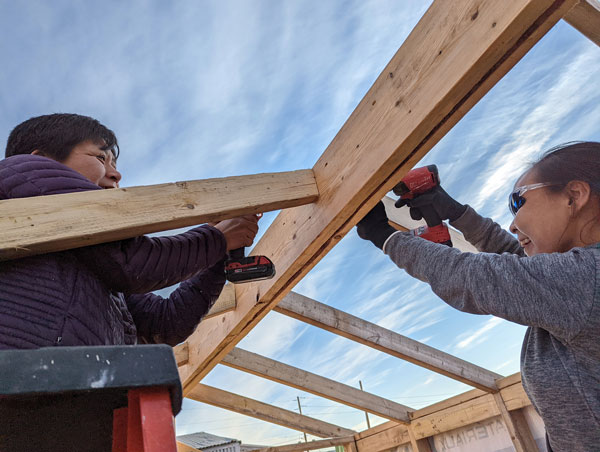 Recently, Inuit women, ranging in age from 35 to 60, took part in a three-week course in Pangnirtung, Nunavut on how to build a wood-frame cabin, with many using power tools for the very first time. Funded by the Nunavut government, the project is administered by the hamlet of Pangnirtung. Plans call for the women’s cabin to be donated to a local group focused on community wellness.