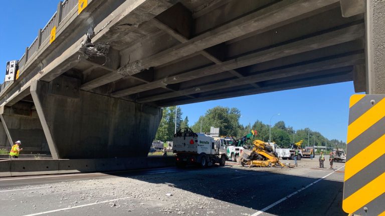 Pictured is the 192nd Street overpass strike that occurred in Surrey, B.C. on July 12 when a flatbed truck towing an excavator hit the overpass.