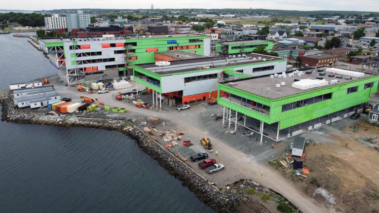 Shown is an aerial view of the Marconi campus taking shape this month on Sydney, N.S.’s waterfront. The $170-million multi-building cantilevered complex will become the main Cape Breton campus of the Nova Scotia Community College.