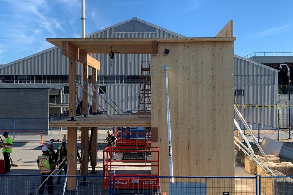 British Columbia Institute of Technology students at the school’s Burnaby campus work on a two-storey mockup as part of the school’s mass timber training program.