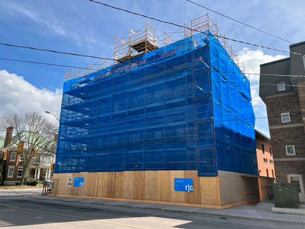 The Bishop’s House under construction in early spring with full height scaffolding to allow access to all areas of each elevation.