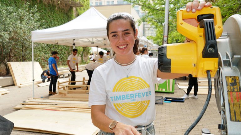 Carmen Carretero, who flew in from the University of California, Berkeley, got a Canadian perspective on timber construction during the TimberFever design-build competition for university engineering and architectural students. Nearly 100 participants competed at the eighth annual thee-day event, hosted at the Toronto Metropolitan University campus.