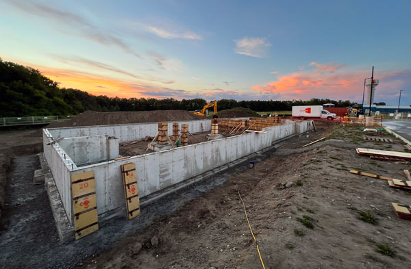 A Token of Commitment is ceremoniously set into an early concrete pour of every project Gillam Group builds. The tokens represents Gillam’s commitment to delivering impactful projects. For the Sky Canoe project, the token was placed in the first concrete footing pour.