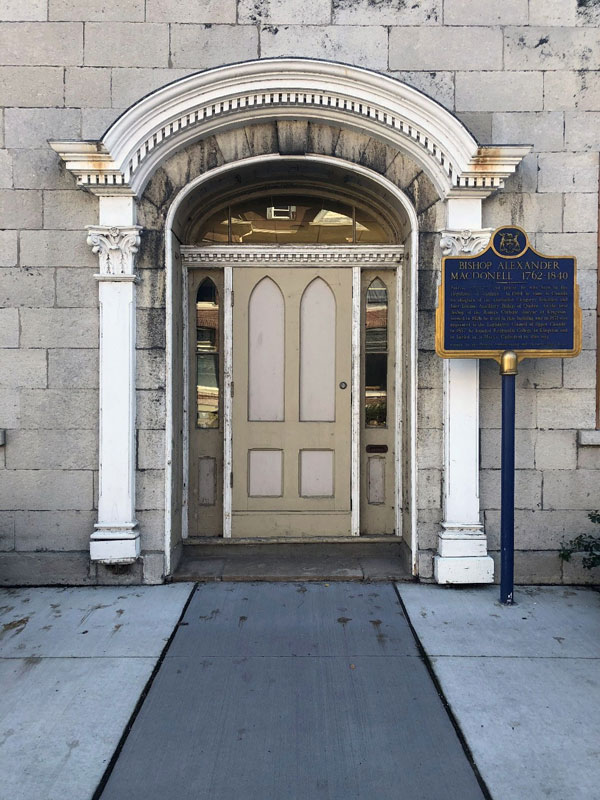 The project includes the restoration of all wood elements throughout the building façade, including all windows, cornice, entrance door and roof canopy.